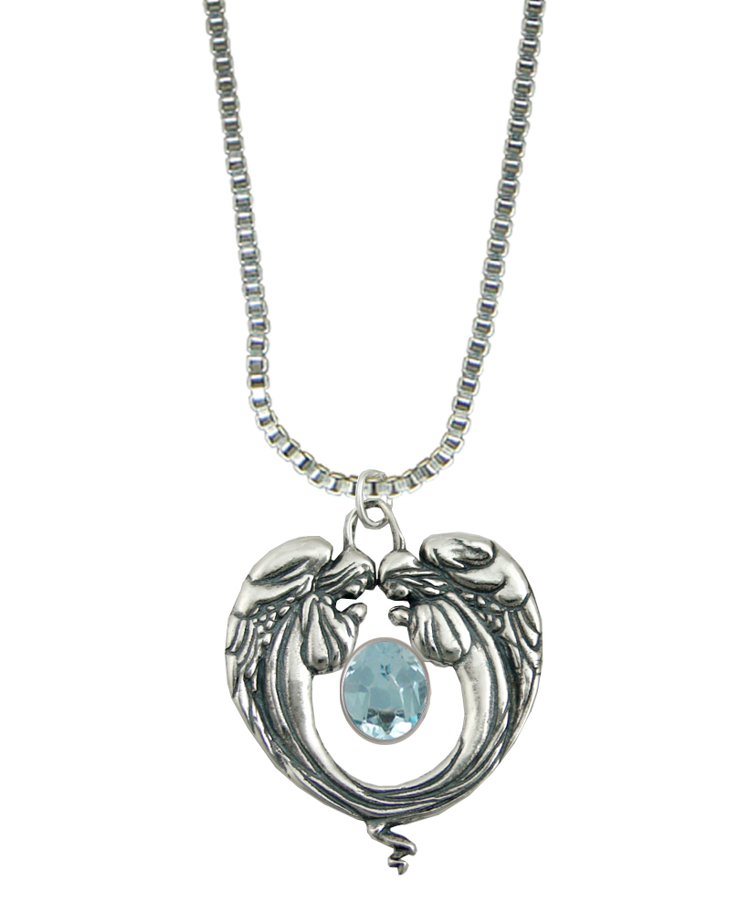 Sterling Silver Bowing Angels Pendant With Blue Topaz